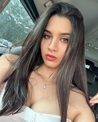 <em>Mia Martinez</em>